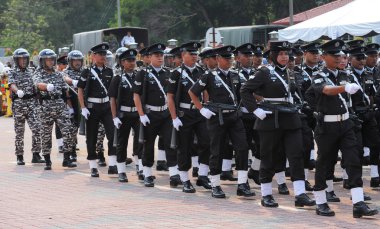 Kuantan-Ağustos 31:Malaysians üzerinde 31 Ağustos 2015 yılında Kuantan, Pahang, Malezya bağımsızlık 58 yaşını kutluyor Ulusal günü yürüyüşü, katılmak.