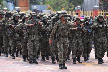 Kuantan-Ağustos 31:Malaysians üzerinde 31 Ağustos 2015 yılında Kuantan, Pahang, Malezya bağımsızlık 58 yaşını kutluyor Ulusal günü yürüyüşü, katılmak.
