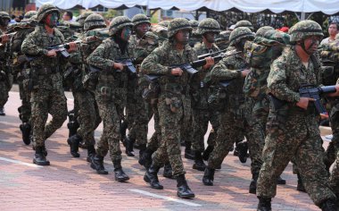 Kuantan-Ağustos 31:Malaysians üzerinde 31 Ağustos 2015 yılında Kuantan, Pahang, Malezya bağımsızlık 58 yaşını kutluyor Ulusal günü yürüyüşü, katılmak.