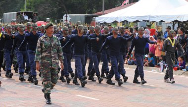 Kuantan-Ağustos 31:Malaysians üzerinde 31 Ağustos 2015 yılında Kuantan, Pahang, Malezya bağımsızlık 58 yaşını kutluyor Ulusal günü yürüyüşü, katılmak.