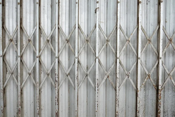 Folding old metal door gate. — Stock Photo, Image