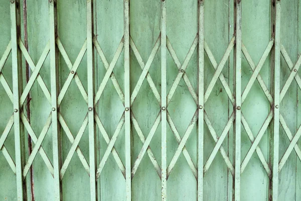 Folding old metal door gate. — Stock Photo, Image