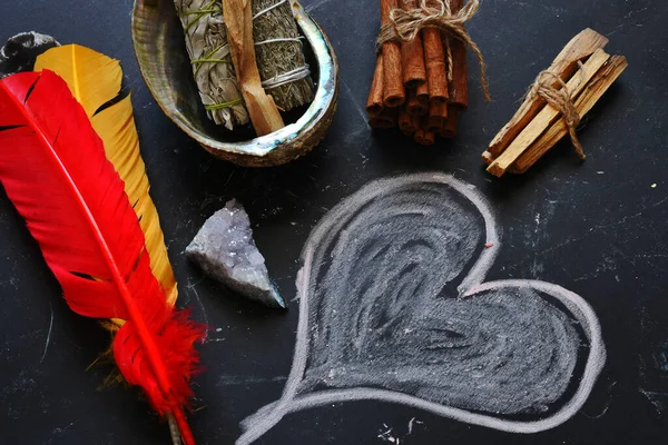 A top view image of a spiritual healing smudge kit bundle on a black background.