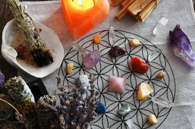 A close up image of a healing chakra grid on a sacred geometry grid cloth.