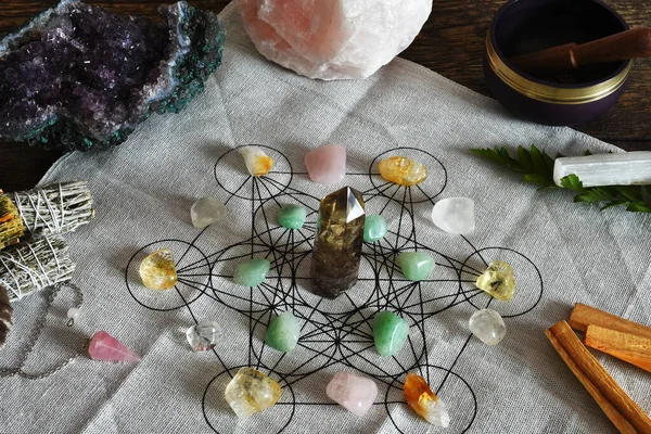 A close up image of a crystal healing grid using sacred geometry.