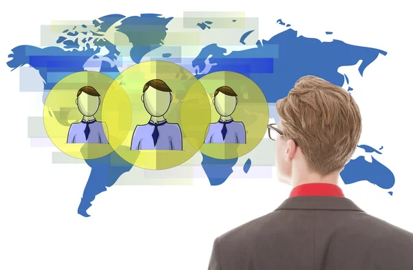 Junger Geschäftsmann schaut auf blaue Weltkarte mit Freunden isoliert auf weißem Hintergrund — Stockfoto