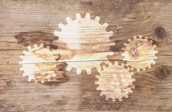 Ilustracja koła zębate o brązowym tle drewnianych — Zdjęcie stockowe