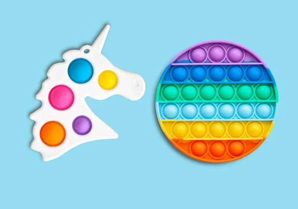 Vielfarbiges beliebtes Silikon-Anti-Stress-Spielzeug lässt es knallen. Bunte Anti-Stress-Sensorspielzeug Fidget Push Pop es. — Stockfoto