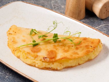 Lezzetli Kystyby, patates ve soğanlı ulusal bir Tatar yemeğidir.