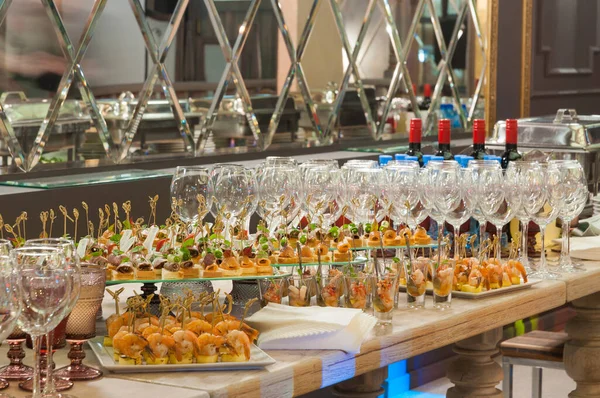 tasty canapes on the buffet in the restaurant. Concept: holidays