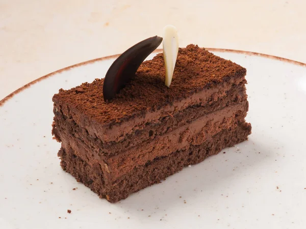 sweet chocolate cake slice truffle with chocolate mousse and sponge cake