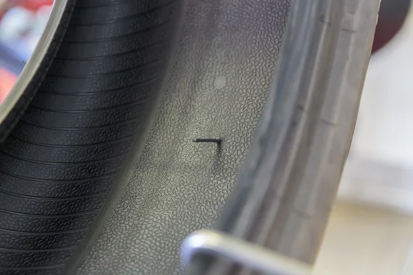 Nail in the tire Royalty Free Stock Images