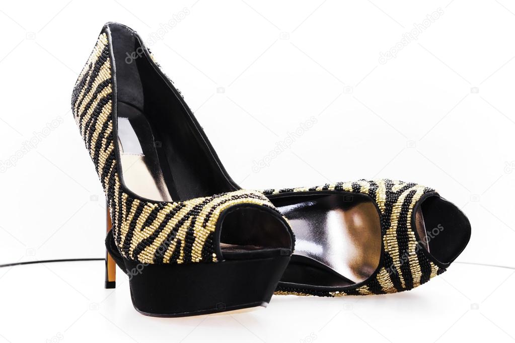 Pair of black-golden shoes