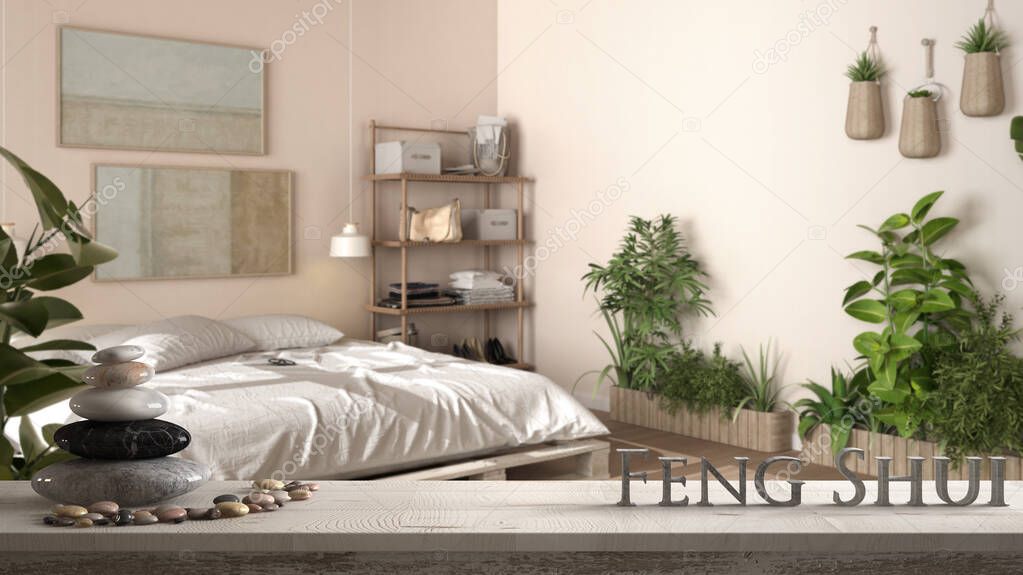 Wooden vintage table shelf with pebble balance and 3d letters making the word feng shui over country rustic wooden bedroom with diy pallet bed with duvet, zen concept interior design