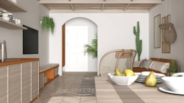 İskandinav etnik oturma ve yemek odası, turuncu ve ahşap mutfak. Koltuk, sandalyeli yemek masası, halı ve kolye lambaları. Saksı bitkileri. Modern iç tasarım fikri