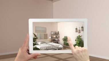 Gelişmiş gerçeklik kavramı. Parke ile içi boş mobilya ve tasarım ürünleri simülasyonu için kullanılan AR uygulaması ile el ele tutuşma tableti, palet diy ile kırsal yatak odası