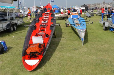DIEPPE, FRANCE - MAY 25, 2019: French Rowing Championship. Water Rowing boats on the grass. clipart