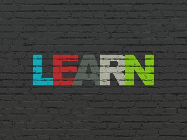 Learning concept: Learn on wall background — Stock Photo, Image