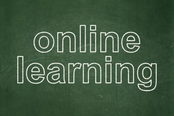 Education concept: Online Learning on chalkboard background — Stok fotoğraf