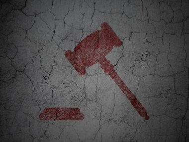 Law concept: Gavel on grunge wall background