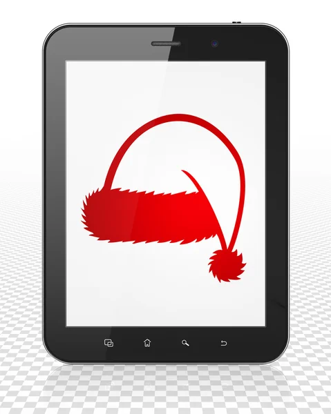 Concept de vacances : Tablette PC avec chapeau de Noël sur l'écran — Photo