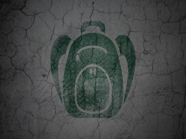 Learning concept: Backpack on grunge wall background