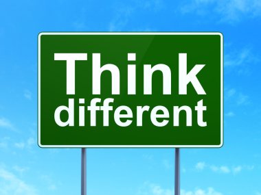 Studying concept: Think Different on road sign background