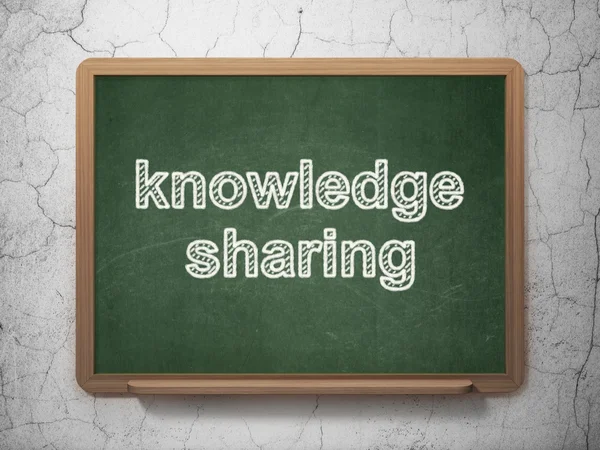 Studying concept: Knowledge Sharing on chalkboard background — Zdjęcie stockowe