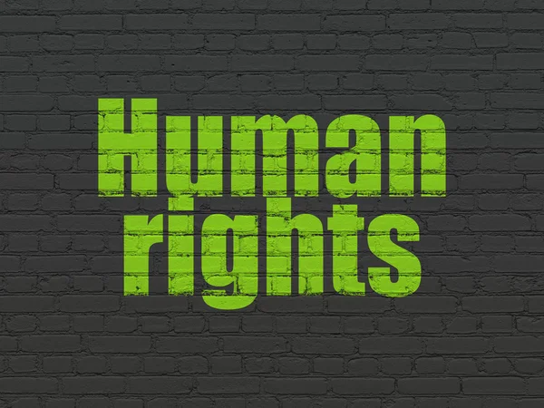 Koncepcji politycznej: praw człowieka, na tle ściany — Zdjęcie stockowe