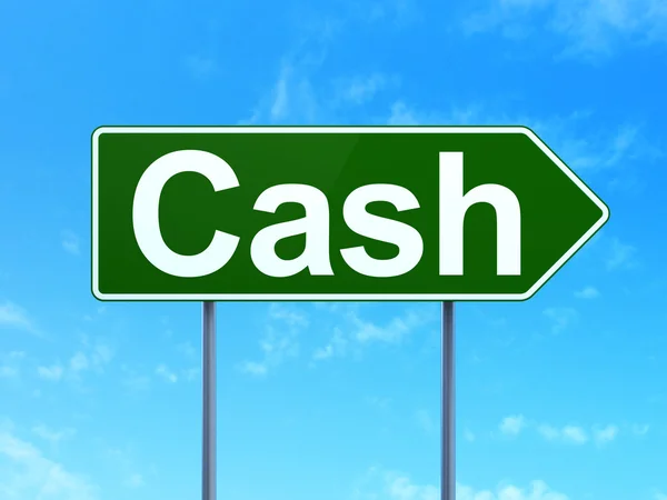 Banking concept: Cash on road sign background — Stockfoto