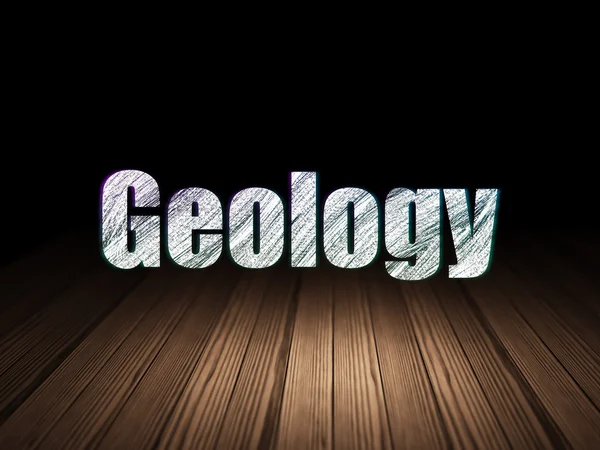 Studying concept: Geology in grunge dark room — Stock Photo, Image