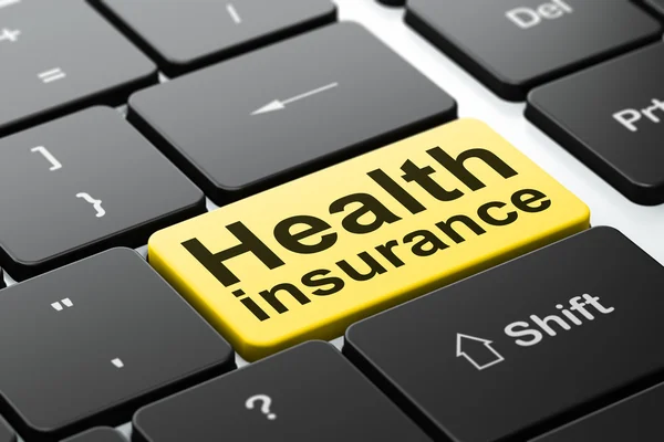 保険の概念: コンピューター キーボードの背景に健康保険 — ストック写真