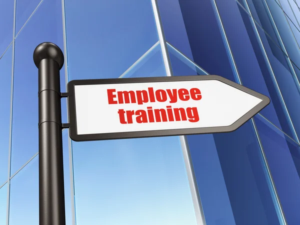 Leerconcept: teken de opleiding van werknemers op de achtergrond van gebouwen — Stockfoto