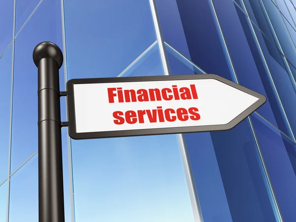 Pénz fogalma: aláírja a pénzügyi szolgáltatások épület háttér — Stock Fotó