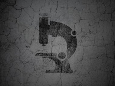 Science concept: Microscope on grunge wall background