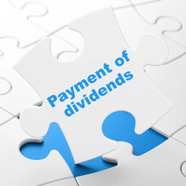Banking concept: Payment Of Dividends on puzzle background