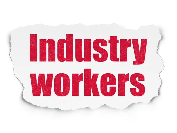 Herstellungskonzept: Industriearbeiter auf zerrissenem Papier — Stockfoto