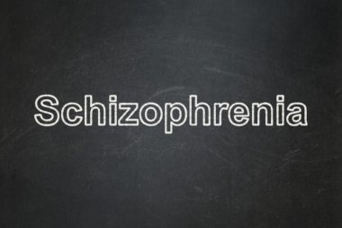 Healthcare concept: Schizophrenia on chalkboard background