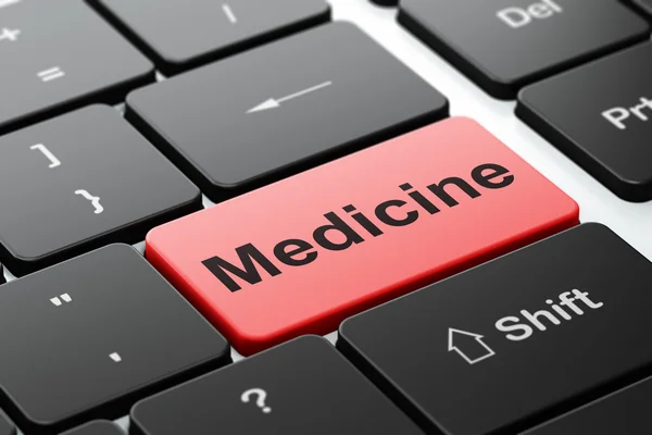 Concepto de salud: Medicina en el fondo del teclado del ordenador —  Fotos de Stock
