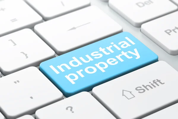 Понятие права: Промышленная собственность на фоне компьютерной клавиатуры — стоковое фото