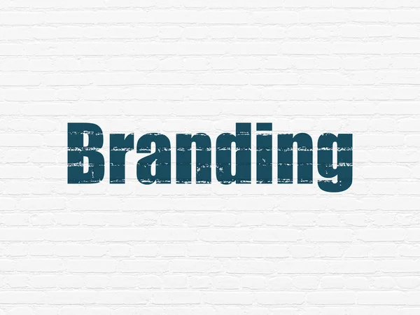 Werbekonzept: Branding auf Wandhintergrund — Stockfoto