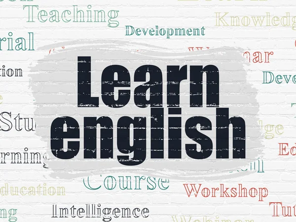 Učební koncept: Učte se anglicky na zeď na pozadí — Stock fotografie