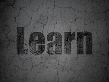 Studying concept: Learn on grunge wall background