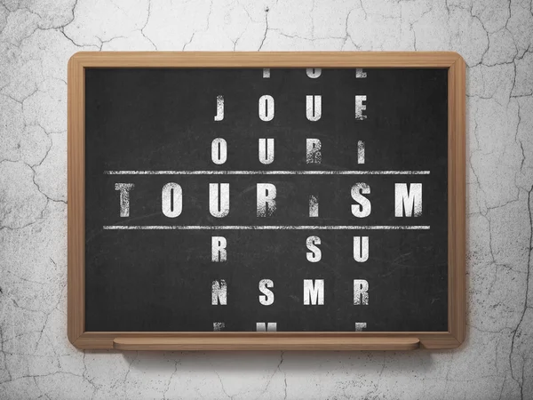 Concepto de vacaciones: Turismo en crucigrama — Foto de Stock