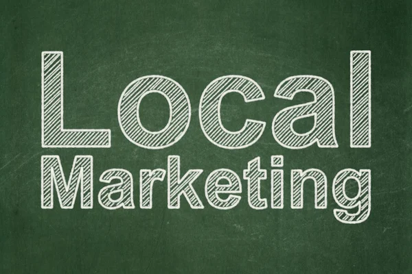 Marketing concept: Local Marketing on chalkboard background