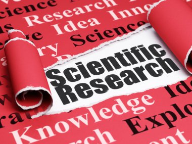 Science concept: black text Scientific Research under the piece of  torn paper