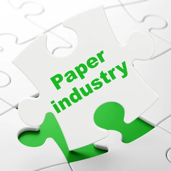 Herstellungskonzept: Papierindustrie vor Puzzlehintergrund — Stockfoto