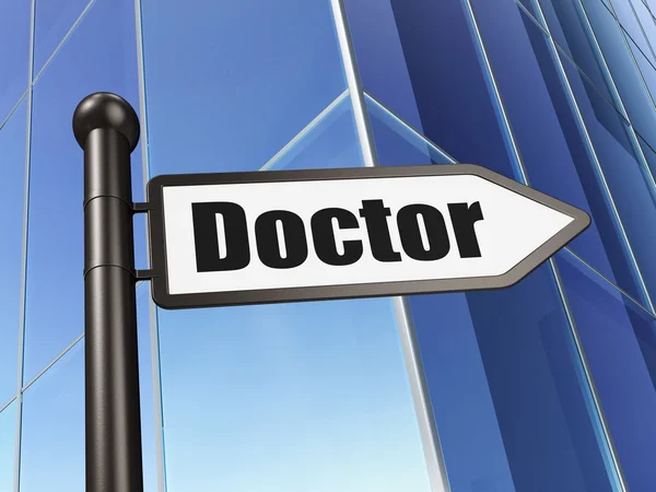 Concetto di medicina: firma Doctor on Building background — Foto Stock