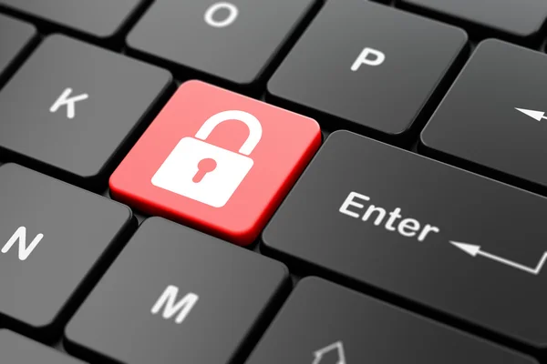 セキュリティの概念: コンピューターのキーボードの背景にロックされた南京錠 — ストック写真