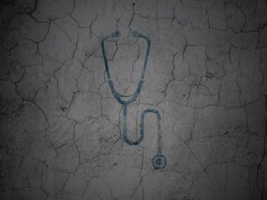 Medicine concept: Stethoscope on grunge wall background